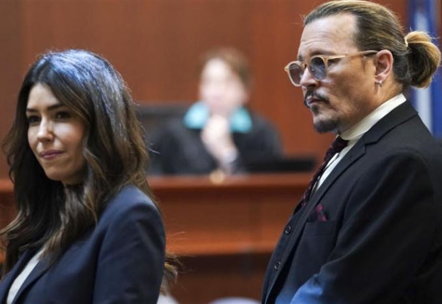 Johnny Depp and his lawyer … from court to summer vacation?